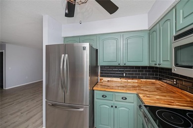 BEAUTIFULLY UPDATED CORNER LOT CHARMER with MAJOR UPDATES! on Oyster Creek Golf Club in Florida - for sale on GolfHomes.com, golf home, golf lot