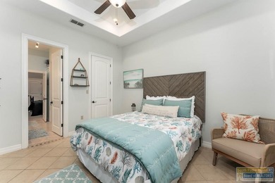 Experience refined lakefront living in this beautifully on South Padre Island Golf Club in Texas - for sale on GolfHomes.com, golf home, golf lot