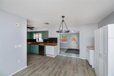 BEAUTIFULLY UPDATED CORNER LOT CHARMER with MAJOR UPDATES! on Oyster Creek Golf Club in Florida - for sale on GolfHomes.com, golf home, golf lot