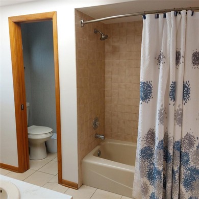 This Key West style Elevated home did not flood during hurricane on Gulf Harbors Golf Course in Florida - for sale on GolfHomes.com, golf home, golf lot