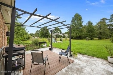 Charming 4-bedroom, 3-bath home located in the heart of on Jacksonville Country Club in North Carolina - for sale on GolfHomes.com, golf home, golf lot
