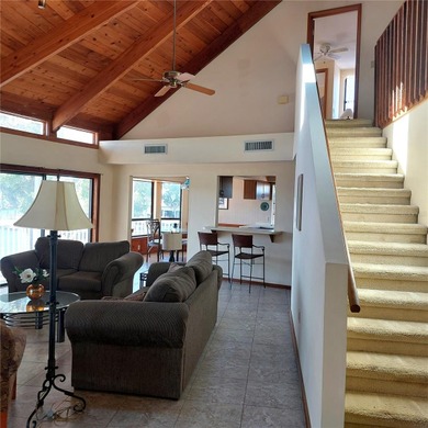 This Key West style Elevated home did not flood during hurricane on Gulf Harbors Golf Course in Florida - for sale on GolfHomes.com, golf home, golf lot