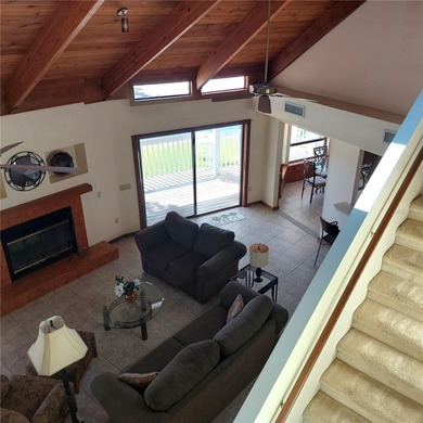 This Key West style Elevated home did not flood during hurricane on Gulf Harbors Golf Course in Florida - for sale on GolfHomes.com, golf home, golf lot