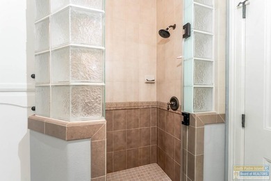 Experience refined lakefront living in this beautifully on South Padre Island Golf Club in Texas - for sale on GolfHomes.com, golf home, golf lot