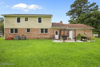 Charming 4-bedroom, 3-bath home located in the heart of on Jacksonville Country Club in North Carolina - for sale on GolfHomes.com, golf home, golf lot