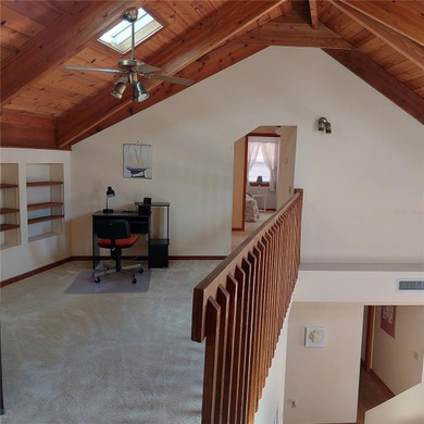 This Key West style Elevated home did not flood during hurricane on Gulf Harbors Golf Course in Florida - for sale on GolfHomes.com, golf home, golf lot