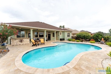 Experience refined lakefront living in this beautifully on South Padre Island Golf Club in Texas - for sale on GolfHomes.com, golf home, golf lot