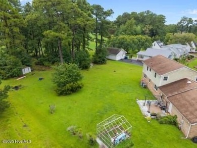 Charming 4-bedroom, 3-bath home located in the heart of on Jacksonville Country Club in North Carolina - for sale on GolfHomes.com, golf home, golf lot