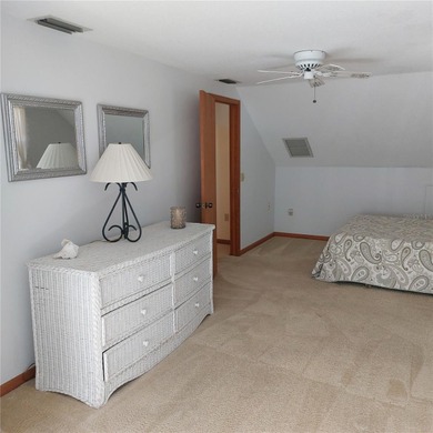 This Key West style Elevated home did not flood during hurricane on Gulf Harbors Golf Course in Florida - for sale on GolfHomes.com, golf home, golf lot