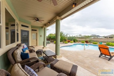 Experience refined lakefront living in this beautifully on South Padre Island Golf Club in Texas - for sale on GolfHomes.com, golf home, golf lot