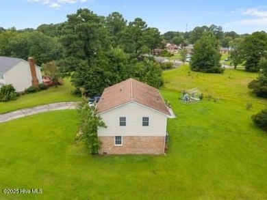 Charming 4-bedroom, 3-bath home located in the heart of on Jacksonville Country Club in North Carolina - for sale on GolfHomes.com, golf home, golf lot