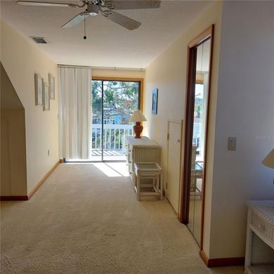 This Key West style Elevated home did not flood during hurricane on Gulf Harbors Golf Course in Florida - for sale on GolfHomes.com, golf home, golf lot