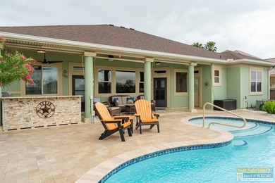 Experience refined lakefront living in this beautifully on South Padre Island Golf Club in Texas - for sale on GolfHomes.com, golf home, golf lot