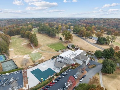 Welcome to an enchanting ranch-style residence nestled in the on Brookfield Country Club in Georgia - for sale on GolfHomes.com, golf home, golf lot