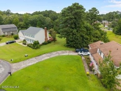 Charming 4-bedroom, 3-bath home located in the heart of on Jacksonville Country Club in North Carolina - for sale on GolfHomes.com, golf home, golf lot