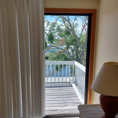 This Key West style Elevated home did not flood during hurricane on Gulf Harbors Golf Course in Florida - for sale on GolfHomes.com, golf home, golf lot