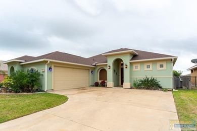 Experience refined lakefront living in this beautifully on South Padre Island Golf Club in Texas - for sale on GolfHomes.com, golf home, golf lot