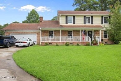 Charming 4-bedroom, 3-bath home located in the heart of on Jacksonville Country Club in North Carolina - for sale on GolfHomes.com, golf home, golf lot