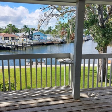 This Key West style Elevated home did not flood during hurricane on Gulf Harbors Golf Course in Florida - for sale on GolfHomes.com, golf home, golf lot