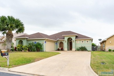 Experience refined lakefront living in this beautifully on South Padre Island Golf Club in Texas - for sale on GolfHomes.com, golf home, golf lot