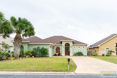 Experience refined lakefront living in this beautifully on South Padre Island Golf Club in Texas - for sale on GolfHomes.com, golf home, golf lot