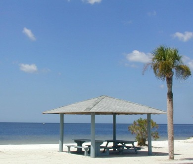 This Key West style Elevated home did not flood during hurricane on Gulf Harbors Golf Course in Florida - for sale on GolfHomes.com, golf home, golf lot