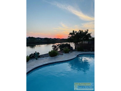 Experience refined lakefront living in this beautifully on South Padre Island Golf Club in Texas - for sale on GolfHomes.com, golf home, golf lot