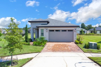 Located in the East Lakes 55+ community of Harmony, this on Harmony Golf Preserve in Florida - for sale on GolfHomes.com, golf home, golf lot