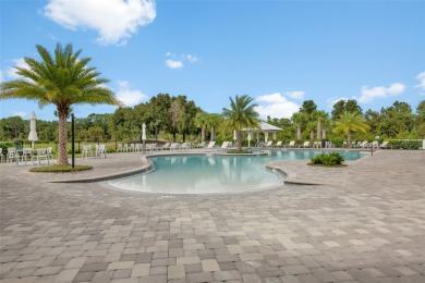Located in the East Lakes 55+ community of Harmony, this on Harmony Golf Preserve in Florida - for sale on GolfHomes.com, golf home, golf lot