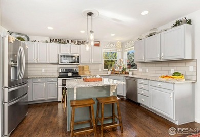 Welcome home to the perfect blend of comfort and Colorado living on Pelican Lakes Golf and Country Club in Colorado - for sale on GolfHomes.com, golf home, golf lot