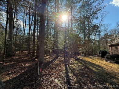 Welcome to an exceptional opportunity to build your dream home on Carolina Trace Country Club in North Carolina - for sale on GolfHomes.com, golf home, golf lot