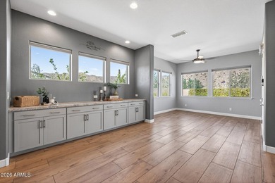 This is a 360 degree mountain view home in Verrado's gated on Verrado Golf Club - Victory in Arizona - for sale on GolfHomes.com, golf home, golf lot