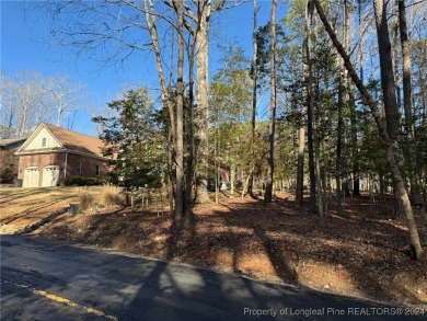 Welcome to an exceptional opportunity to build your dream home on Carolina Trace Country Club in North Carolina - for sale on GolfHomes.com, golf home, golf lot