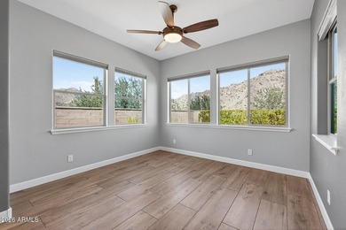 This is a 360 degree mountain view home in Verrado's gated on Verrado Golf Club - Victory in Arizona - for sale on GolfHomes.com, golf home, golf lot