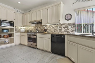 Behind the gates of desirable Whitehawk, this lovely 3 bedroom on Palm Desert Resort Country Club in California - for sale on GolfHomes.com, golf home, golf lot