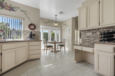 Behind the gates of desirable Whitehawk, this lovely 3 bedroom on Palm Desert Resort Country Club in California - for sale on GolfHomes.com, golf home, golf lot