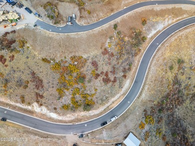 Nestled within the exclusive Tuhaye community, just minutes from on Talisker Club At Tuhaye in Utah - for sale on GolfHomes.com, golf home, golf lot