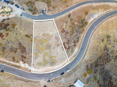 Nestled within the exclusive Tuhaye community, just minutes from on Talisker Club At Tuhaye in Utah - for sale on GolfHomes.com, golf home, golf lot