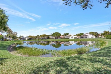 Welcome Home to this stunning, FULLY FURNISHED modified Dover on Westchester Golf and Country Club in Florida - for sale on GolfHomes.com, golf home, golf lot