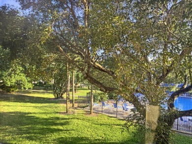 **DRASTIC REDUCTION** GATED, GOLF COMMUNITY WITH THEATER on Wynmoor Golf Course in Florida - for sale on GolfHomes.com, golf home, golf lot