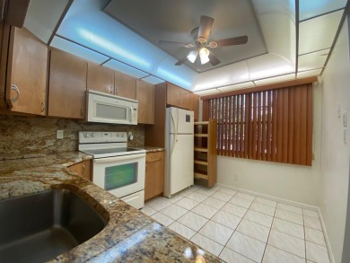 **DRASTIC REDUCTION** GATED, GOLF COMMUNITY WITH THEATER on Wynmoor Golf Course in Florida - for sale on GolfHomes.com, golf home, golf lot
