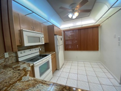 **DRASTIC REDUCTION** GATED, GOLF COMMUNITY WITH THEATER on Wynmoor Golf Course in Florida - for sale on GolfHomes.com, golf home, golf lot