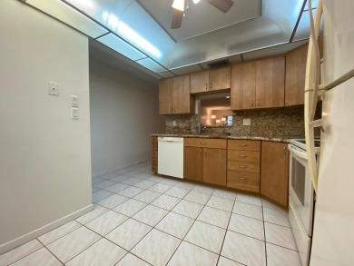 **DRASTIC REDUCTION** GATED, GOLF COMMUNITY WITH THEATER on Wynmoor Golf Course in Florida - for sale on GolfHomes.com, golf home, golf lot