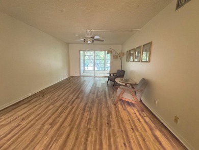 **DRASTIC REDUCTION** GATED, GOLF COMMUNITY WITH THEATER on Wynmoor Golf Course in Florida - for sale on GolfHomes.com, golf home, golf lot