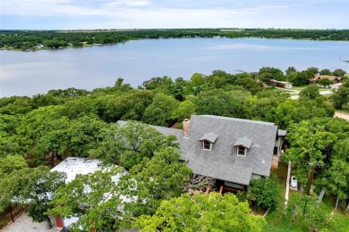 Stunning Log Cabin with breathtaking panoramic views of Lake on Nocona Hills Golf Course in Texas - for sale on GolfHomes.com, golf home, golf lot