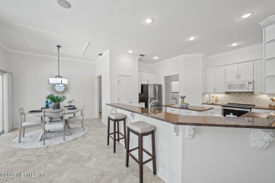 The great room beckons with a view overlooking a 12' x 35' on Grand Haven Golf Club in Florida - for sale on GolfHomes.com, golf home, golf lot