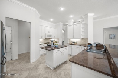 The great room beckons with a view overlooking a 12' x 35' on Grand Haven Golf Club in Florida - for sale on GolfHomes.com, golf home, golf lot