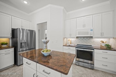 The great room beckons with a view overlooking a 12' x 35' on Grand Haven Golf Club in Florida - for sale on GolfHomes.com, golf home, golf lot