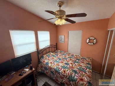 Vacation home or turn-key rental for investors, this waterfront on Long Island Golf Course in Texas - for sale on GolfHomes.com, golf home, golf lot