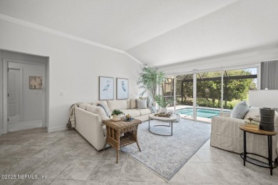 The great room beckons with a view overlooking a 12' x 35' on Grand Haven Golf Club in Florida - for sale on GolfHomes.com, golf home, golf lot